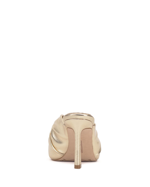 Gold high heel mule with gathered upper and stiletto heel, back view.
