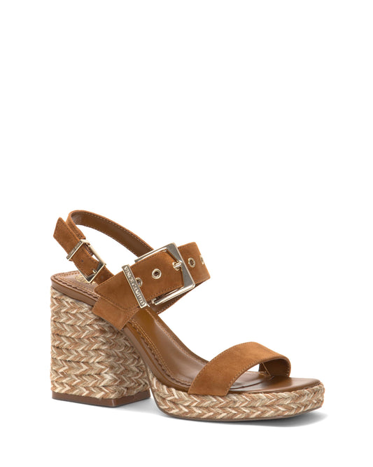 Brown block-heeled sandal with buckle straps and espadrille platform.