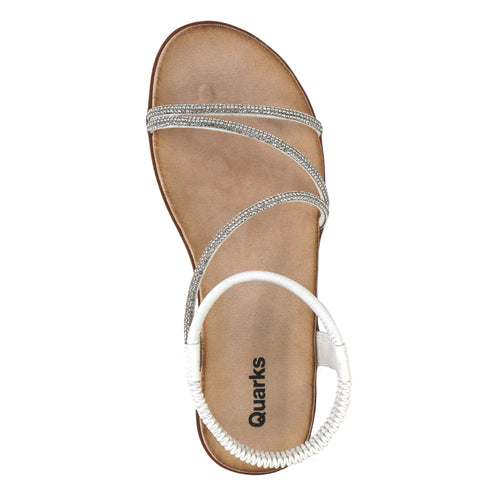 Flat sandal with thin, sparkly, crisscrossing straps, and a white elastic ankle strap.