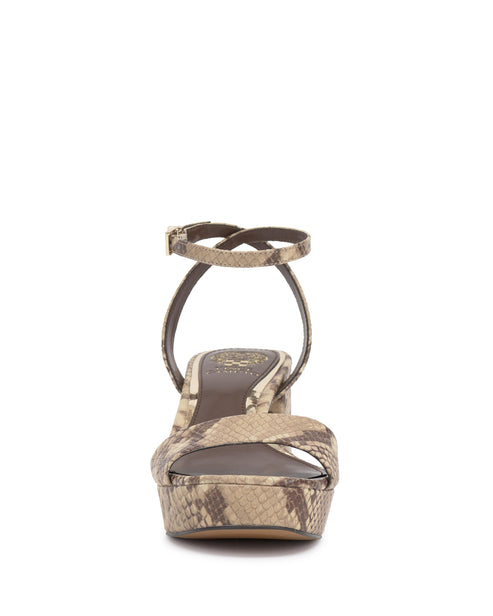 Front view of high heel snake print platform sandals with an ankle strap.