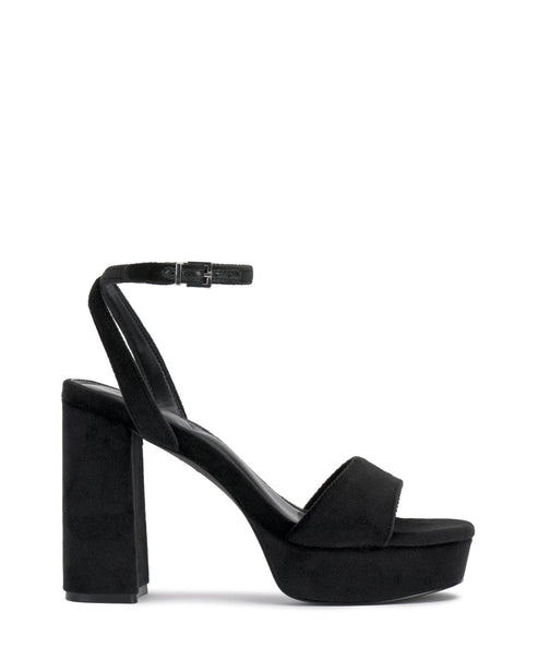 Black platform high heel with ankle strap.