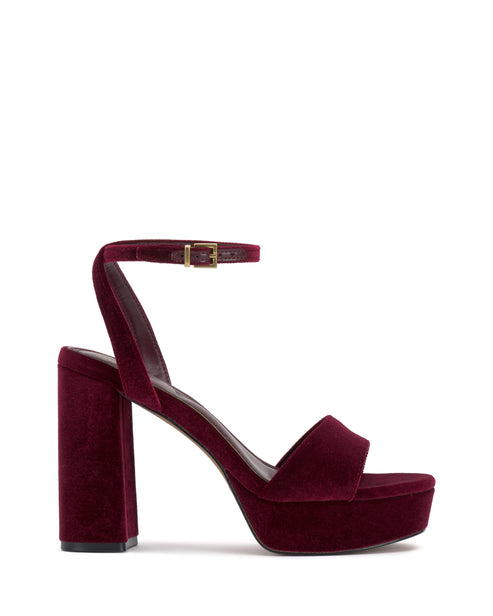 Burgundy velvet platform sandal with block heel and ankle strap.