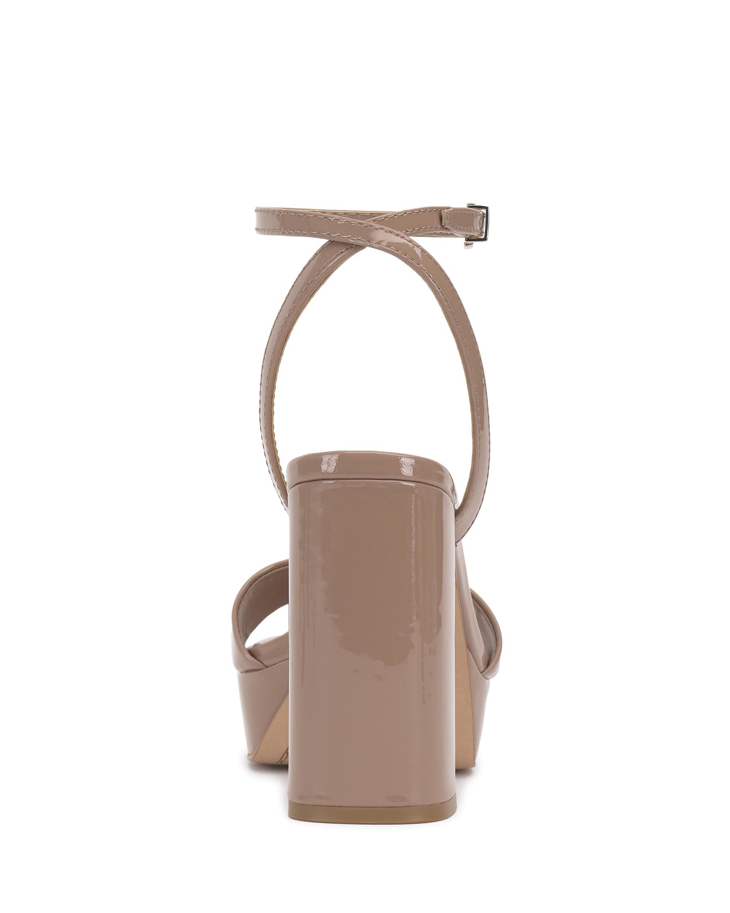 Beige patent leather platform sandal with a block heel and ankle strap.