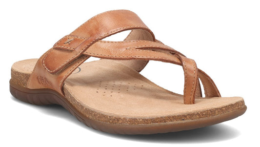 Tan leather sandal with toe loop and adjustable strap.