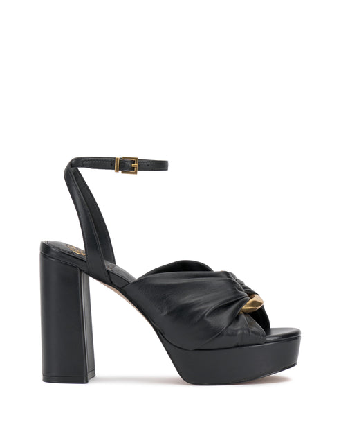 Black platform sandal with block heel and ankle strap.