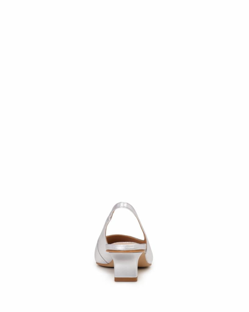 Rear view of a white heeled slingback shoe.