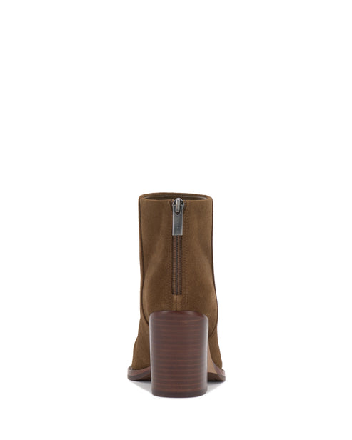 Back view of a light brown ankle boot featuring a visible zipper and stacked block heel.