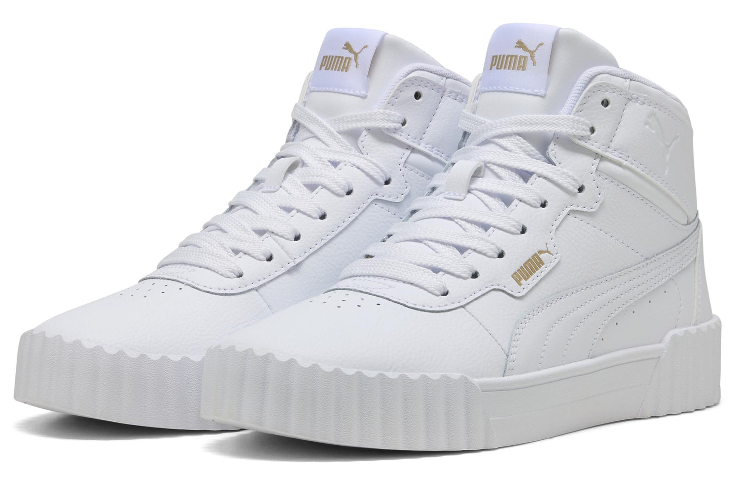 A pair of white high-top sneakers with white laces and a white sole.