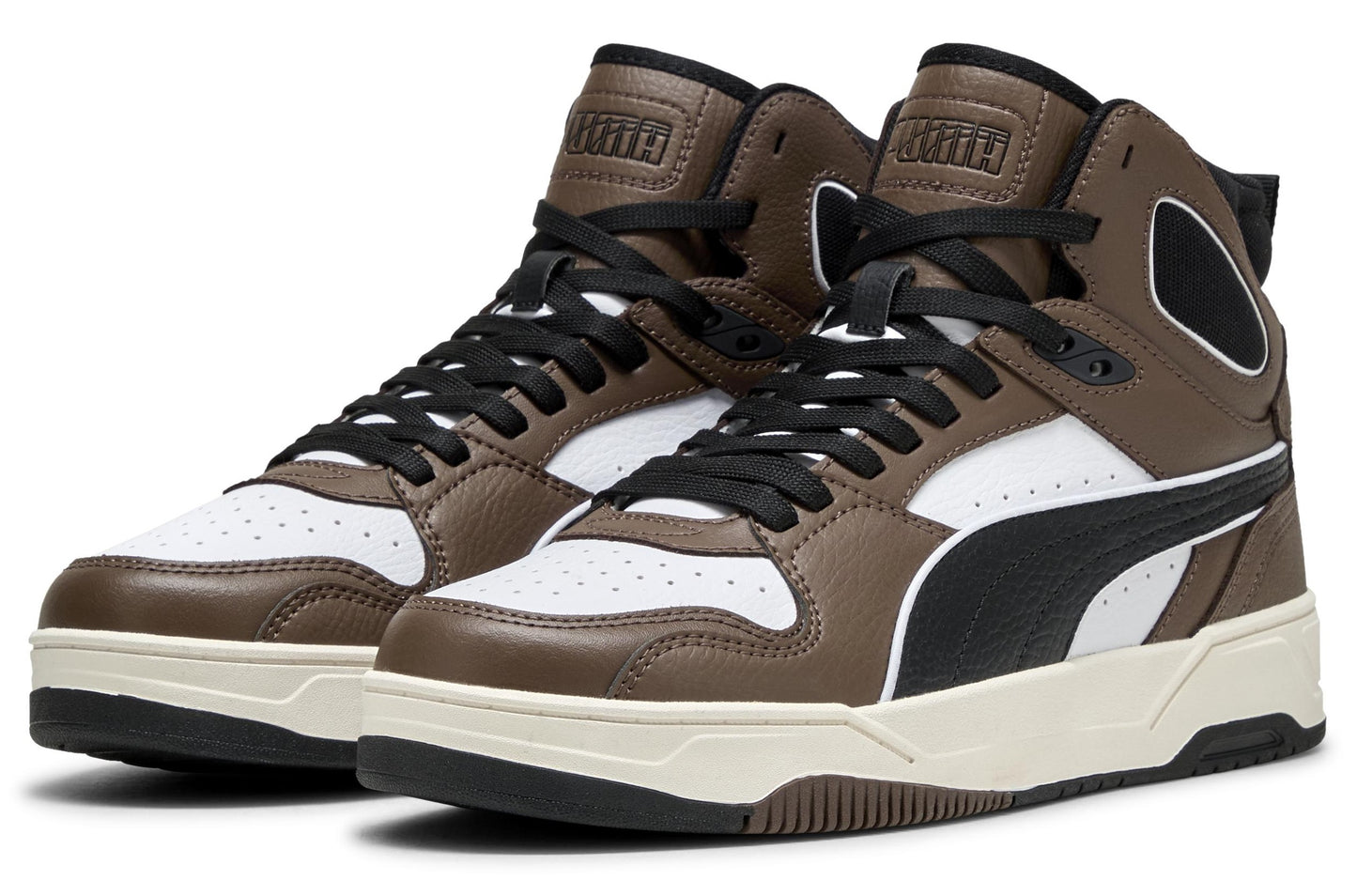 A pair of high-top sneakers; leather panels in white, brown and black; black laces and white soles.