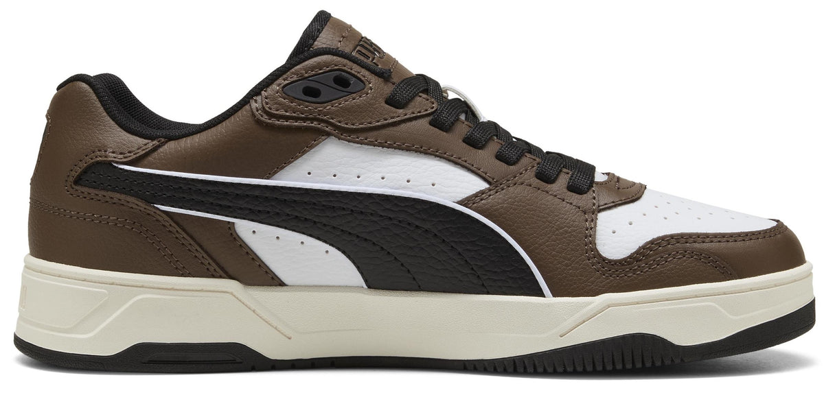 A brown and white sneaker with a black stripe on the side.