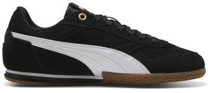 A black casual shoe with a white stripe and brown sole.