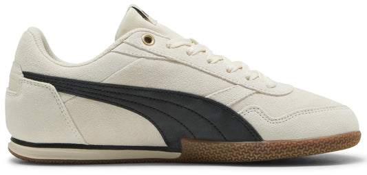 A low top sneaker with a beige upper and a dark brown outsole. There is a black stripe on the side.