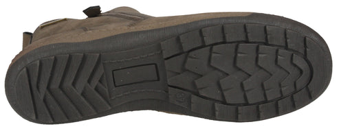 The bottom of a brown shoe with a dark tread.