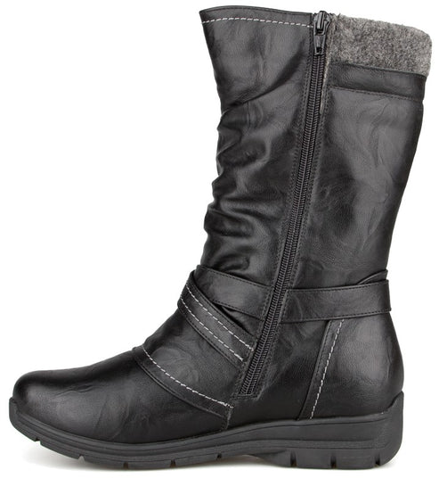 A black calf-length boot with a slight slouchy shaft, a side zipper, a decorative ankle strap with white contrast stitching, and a grey wool-like cuff at the top, shown from a side profile against a white background.