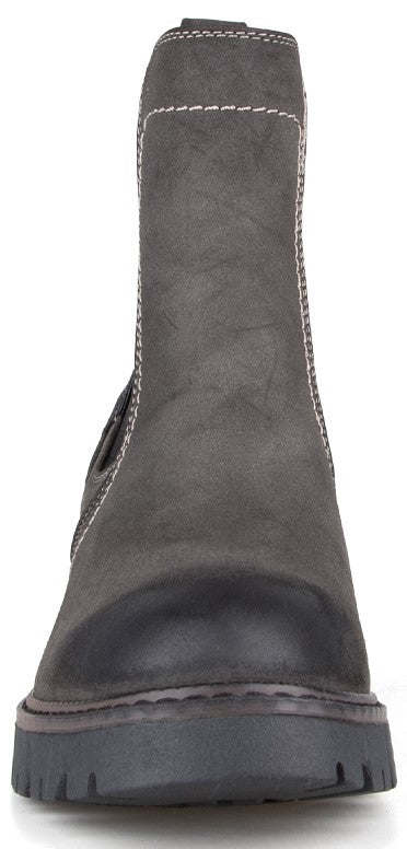 A gray leather ankle boot with a black rubberized toe cap and a rugged, thick black lug sole, viewed from directly in front.
