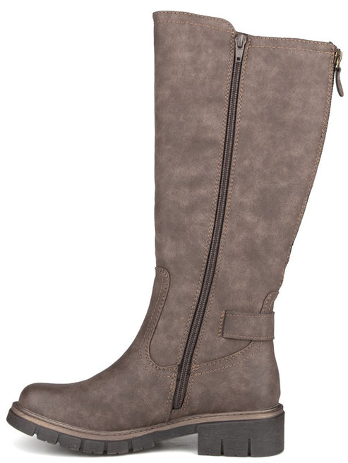 A gray, knee-high faux leather boot with a side zipper, a buckled strap detail at the ankle, and a thick, lugged sole.