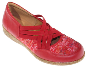 Red leather ballet flat with elastic criss-cross straps and printed vamp.