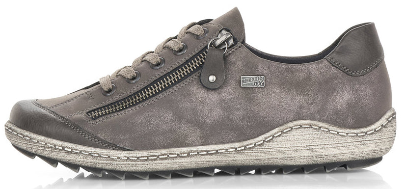 A gray low top sneaker with zipper detail and laces.