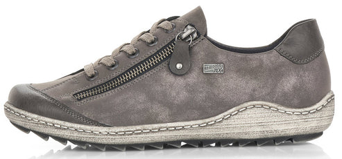 A gray low top sneaker with zipper detail and laces.