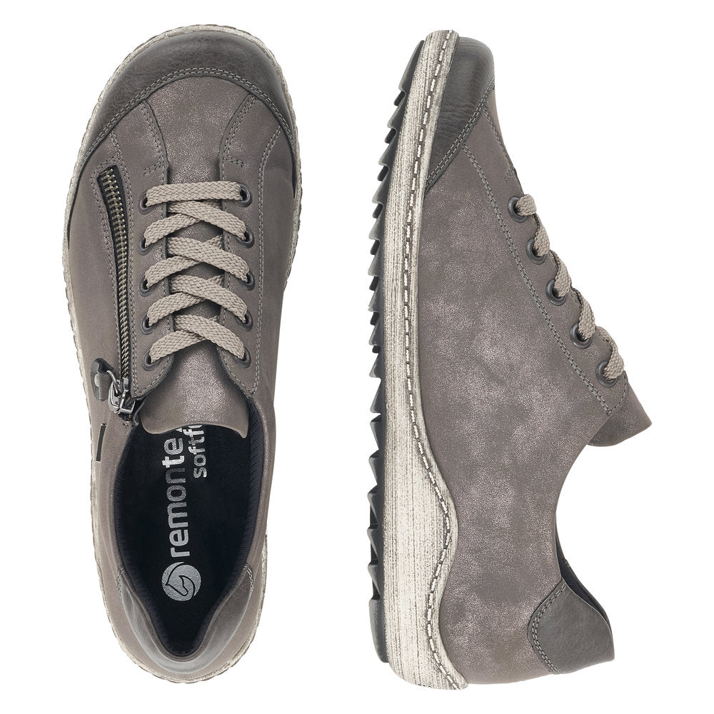 Pair of low-top grey sneakers with laces and side zipper detail.