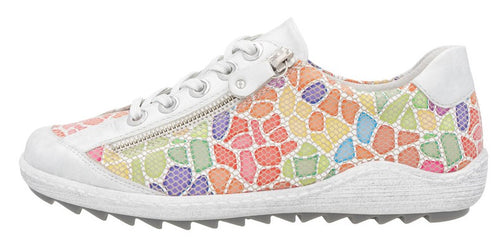A colorful sneaker with a white sole and white laces.