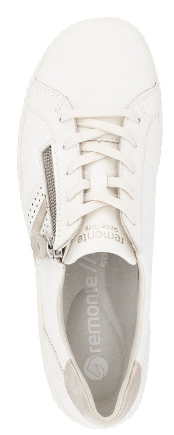 A white sneaker with a side zipper and laces.