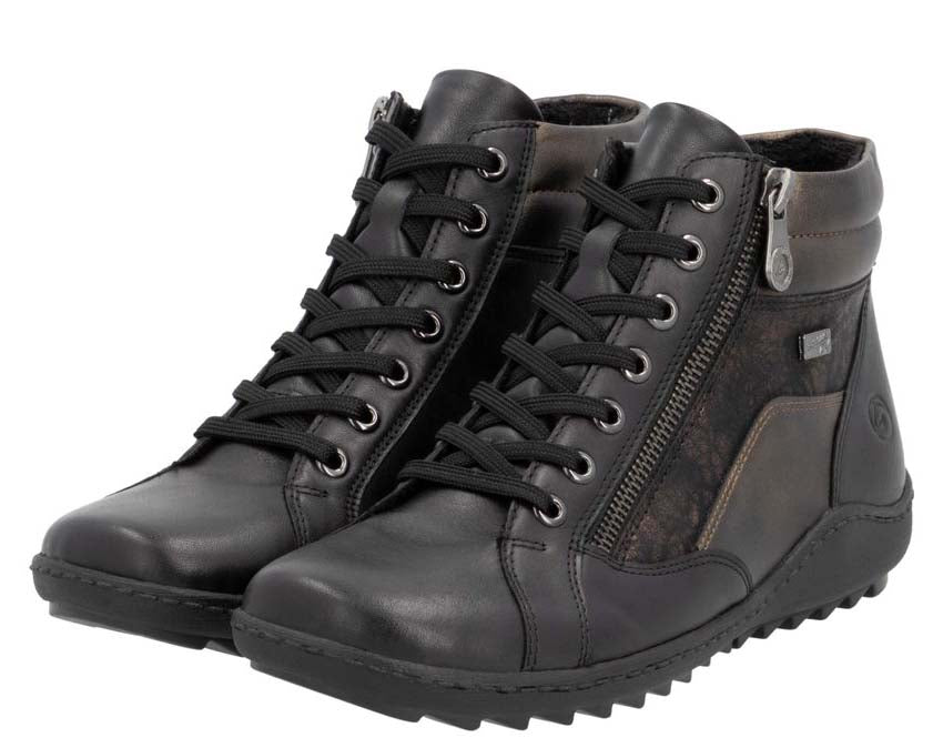 Pair of black leather ankle boots with lace-up and zipper closures.