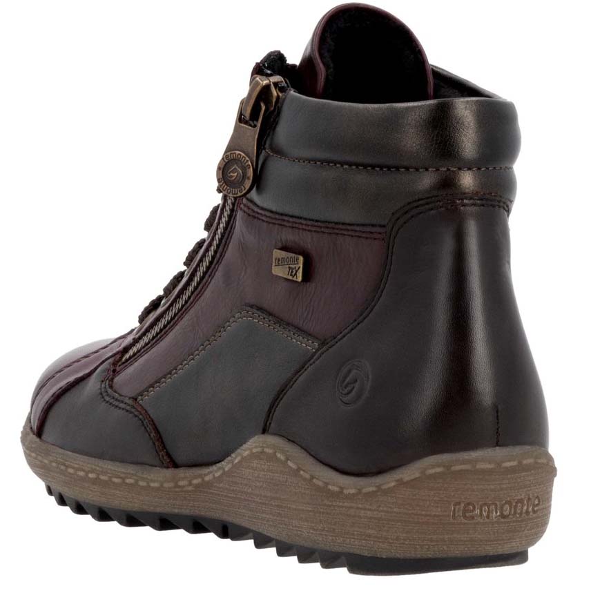 Rear view of a dark red and brown ankle boot with a zipper closure and a light brown sole, featuring the word 'remonte' on the sole.