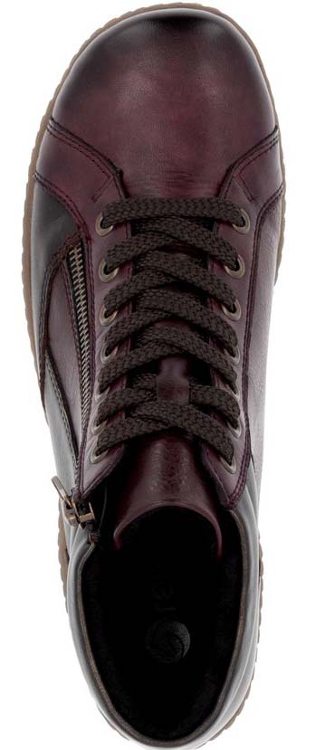 Burgundy sneaker with laces and zipper.