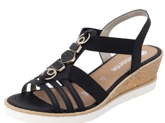 Black wedge sandal with stone accents and elastic straps.