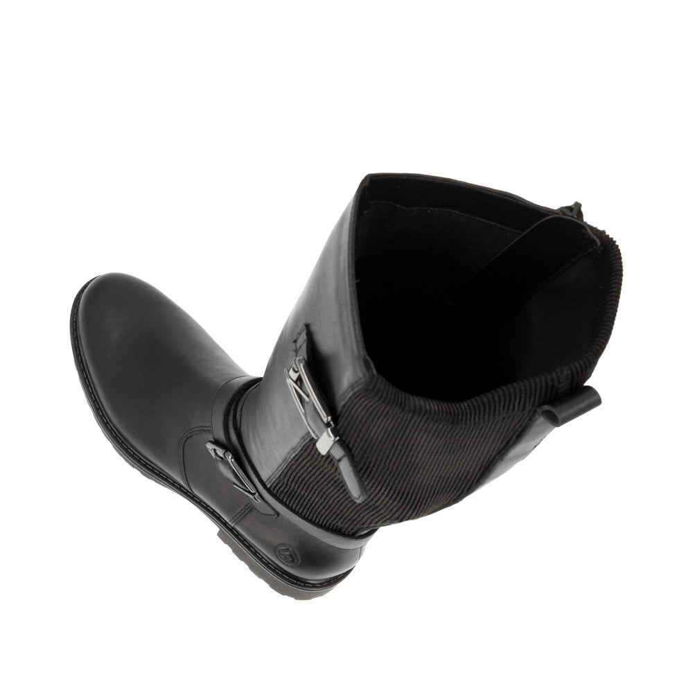 Black leather boot with buckle and elastic at top, inside view.