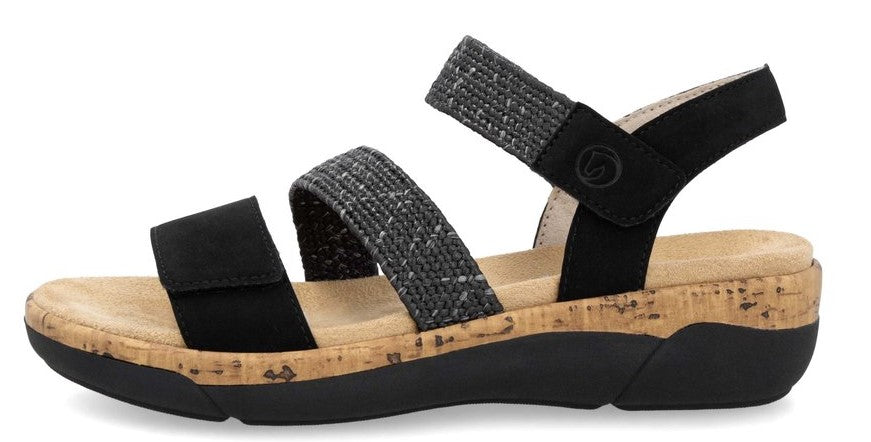 Sandals with black straps and cork sole.