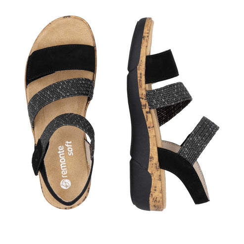 A pair of Remonte Soft sandals with two black and grey patterned straps.