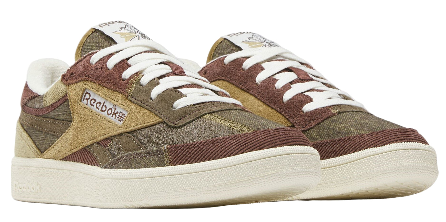 Pair of low top sneakers with brown and beige panels, white laces, and white sole.