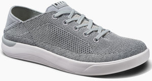 Gray low-top sneaker with knit upper and white sole.