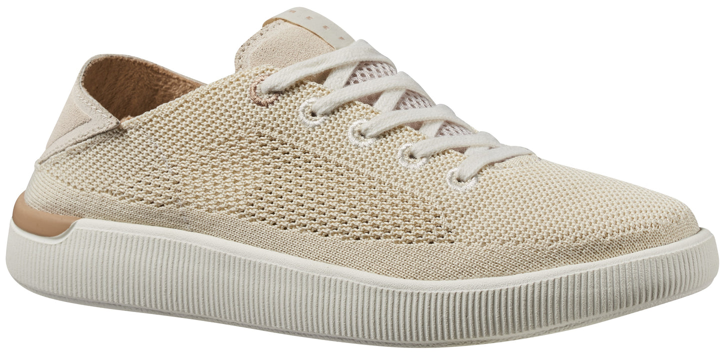 Beige knit sneaker with thick sole and beige laces.