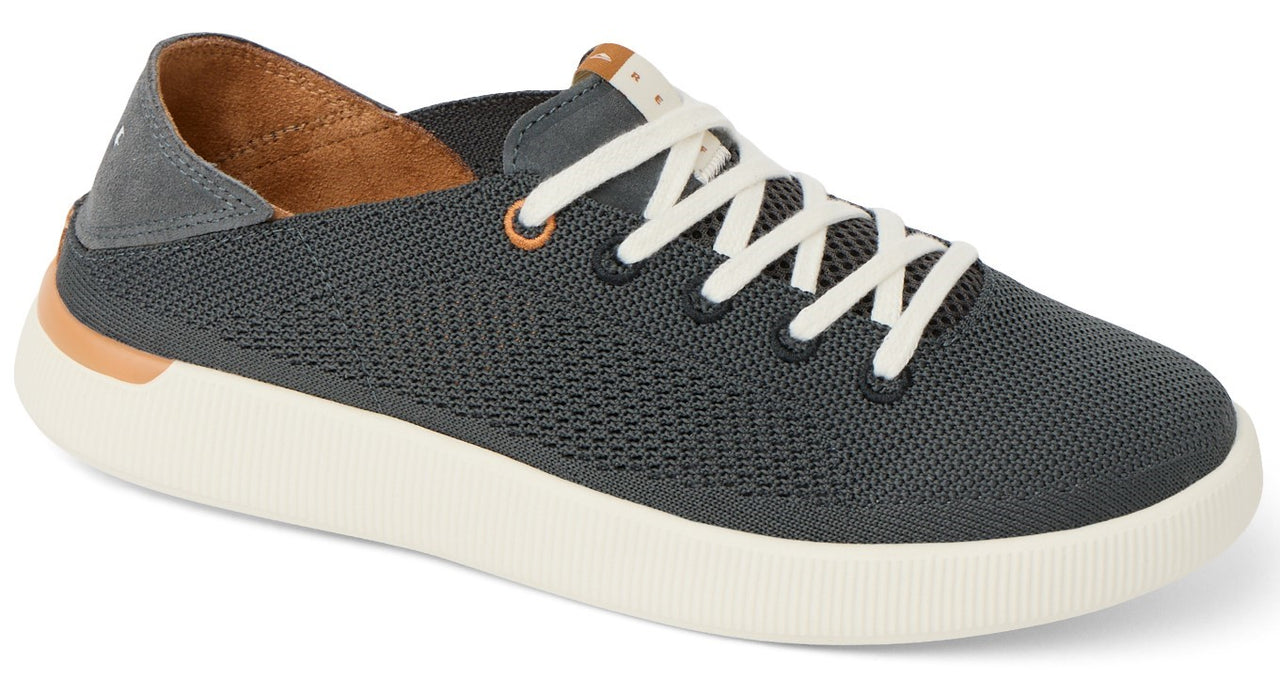 Gray knit sneaker with white laces and sole, with brown interior.