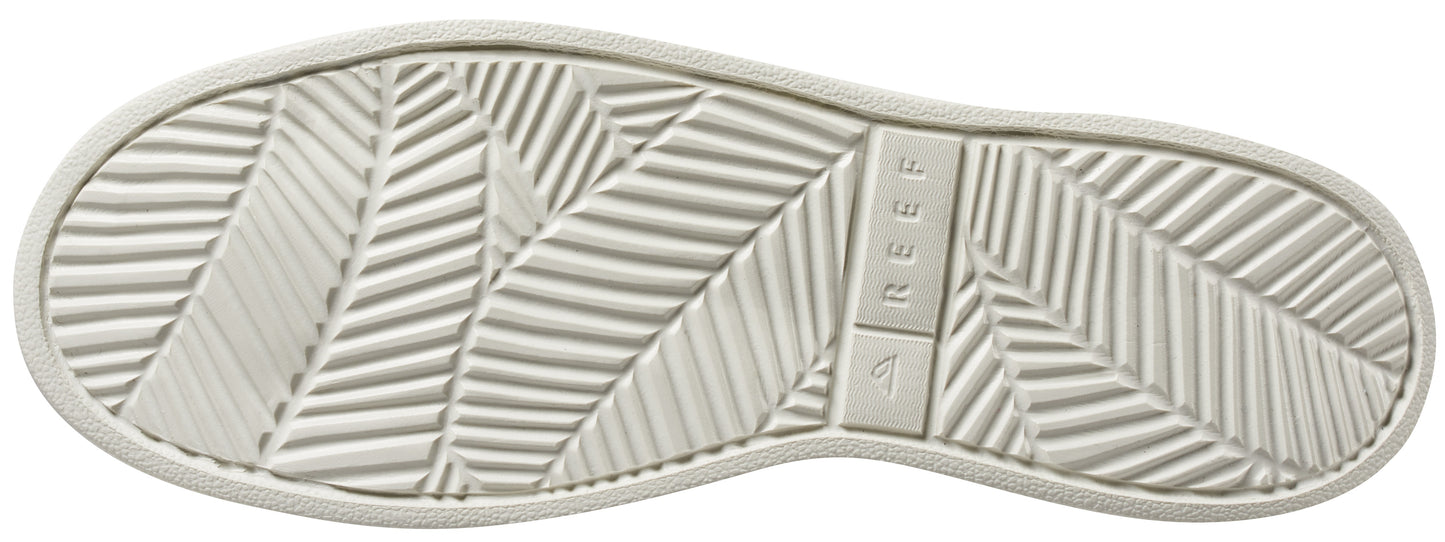 White shoe sole with REEF label and herringbone pattern.