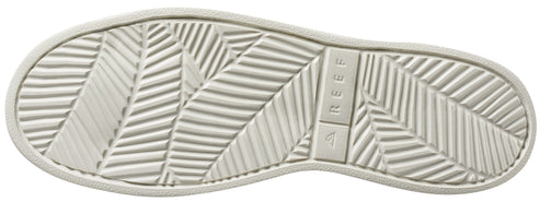 White shoe sole with REEF label and herringbone pattern.