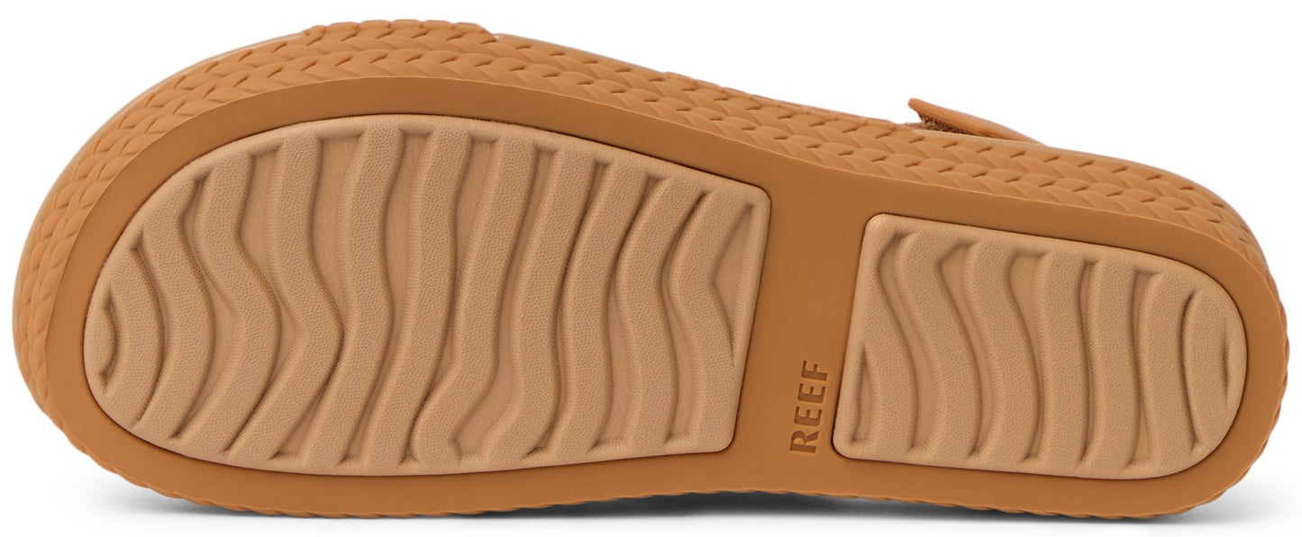 tan sandal bottom with REEF lettering
