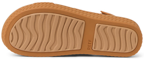 tan sandal bottom with REEF lettering