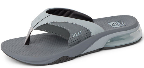 A gray sandal-style flip-flop with REEF logo.