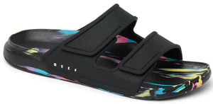 Black sandals with dual straps and colorful speckled soles.