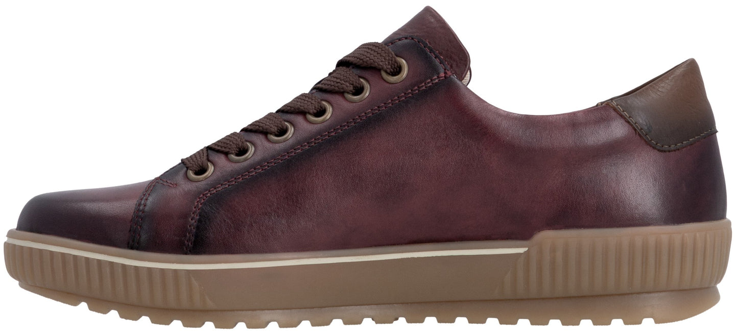 A side view of a dark maroon leather sneaker with a brown, flat, ridged rubber sole and matching dark maroon laces.