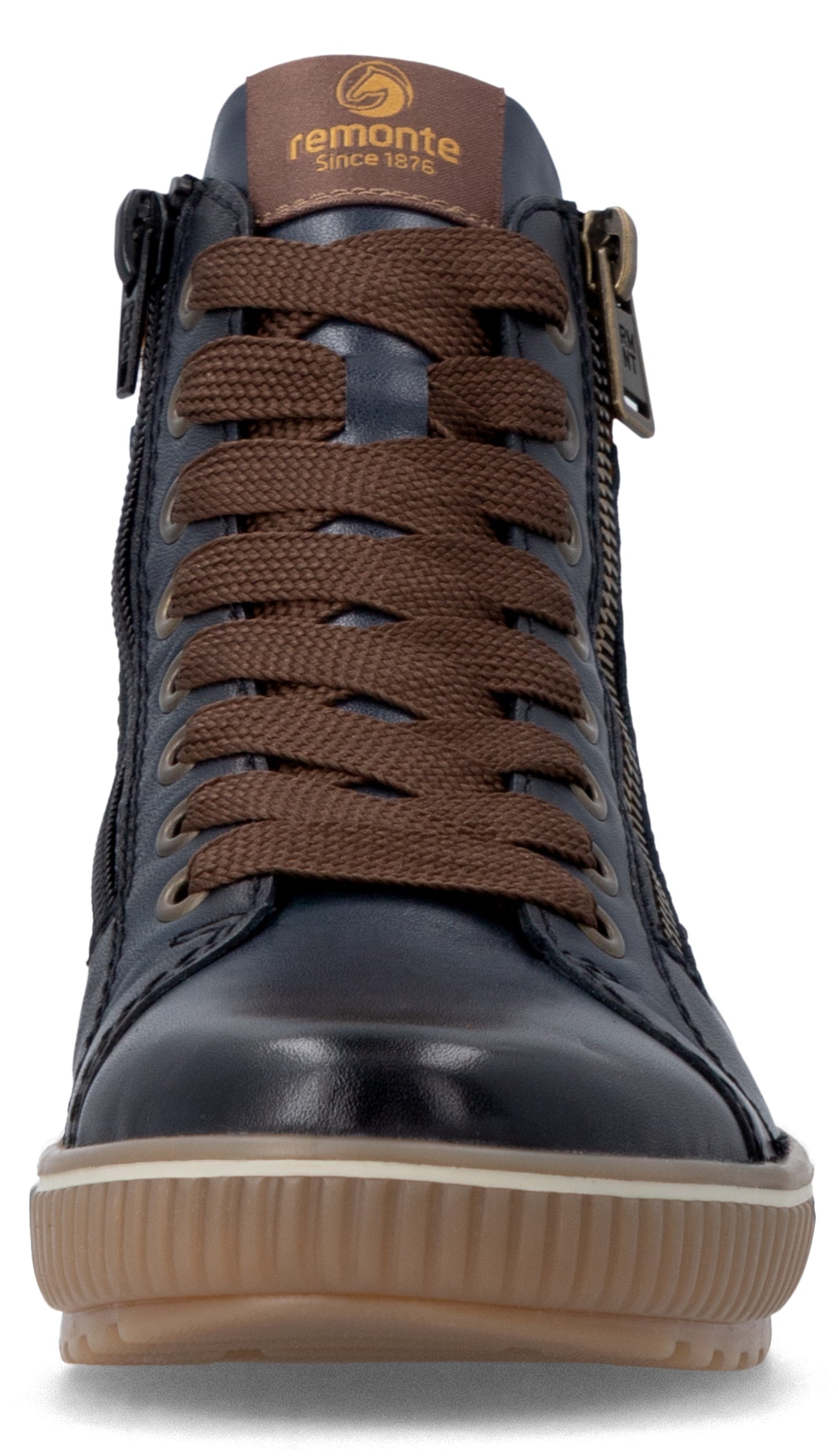 A front-facing view of a dark blue leather high-top sneaker with brown laces and a tan ribbed rubber sole, featuring a brown leather patch on the tongue with the text 'remonte since 1876'.