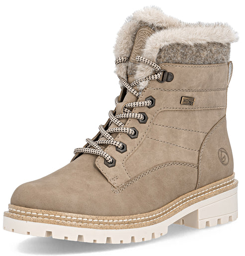 A light beige, lace-up winter boot with a faux-fur trimmed collar, gray wool-like top section, matching laces with metallic eyelets, and a thick, textured white lug sole.