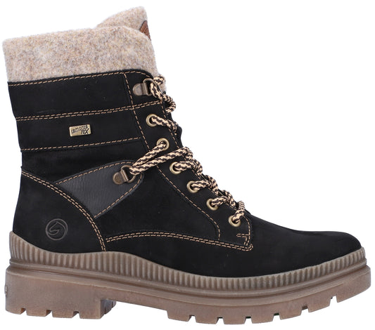 Black lace-up boot with a tan-colored corrugated sole and faux fur lining.