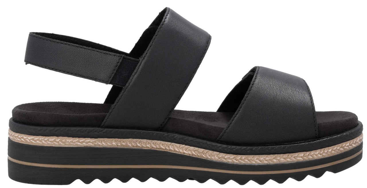 Black platform sandal with two straps and an elastic ankle strap.