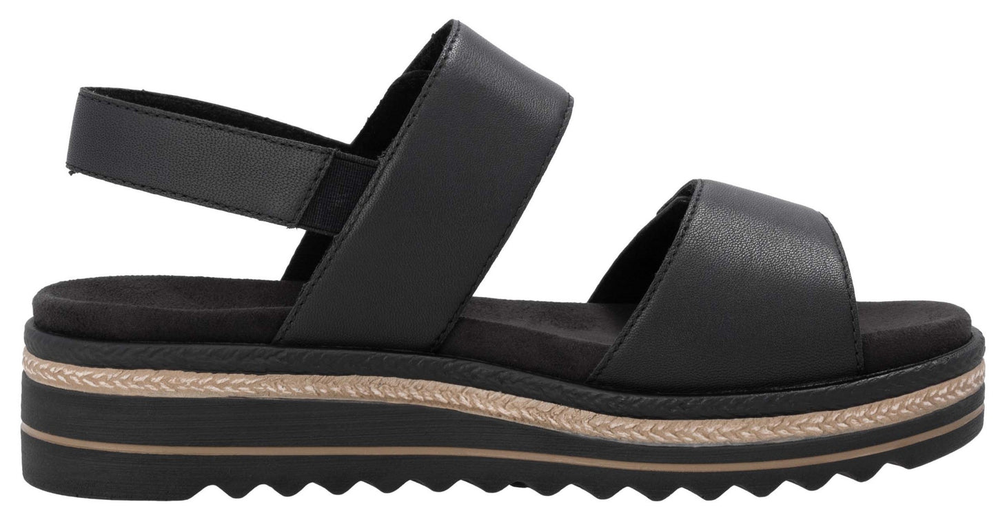Black platform sandal with two straps and an elastic ankle strap.