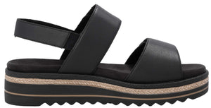 Black platform sandal with two straps and an elastic ankle strap.